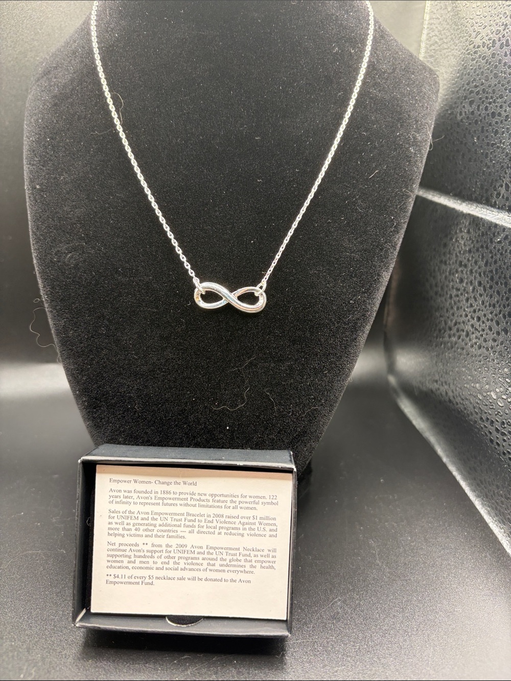 Vintage Avon infinity necklace in silver-tone